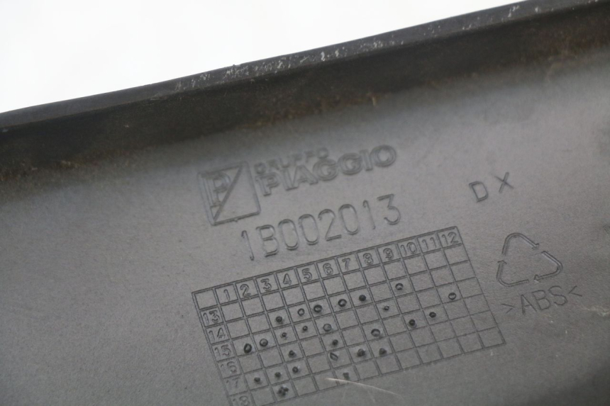photo de CACHE SOUS SELLE DROIT PIAGGIO MP3 HPE 350 (2018 - 2020) - Pièce contrôlée