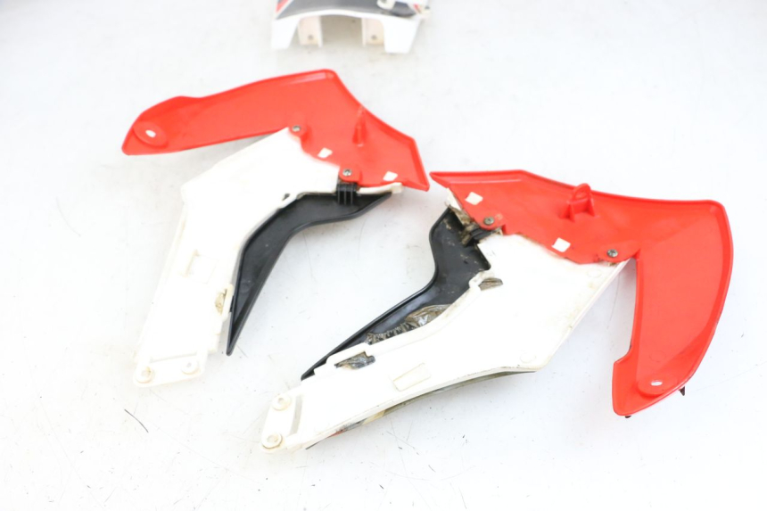 photo de CARROSSERIE CARENAGE COMPLET MINI MX SX 125 - Zoom état d’usage