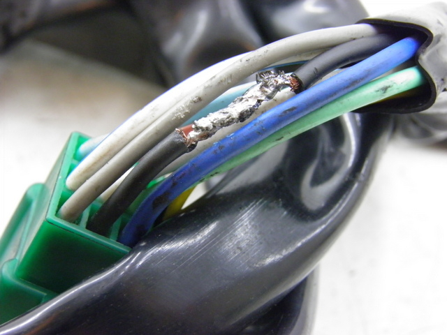 photo de COMMODO GAUCHE KYMCO QUANNON NAKED 125 (2010) - Autre angle de vue