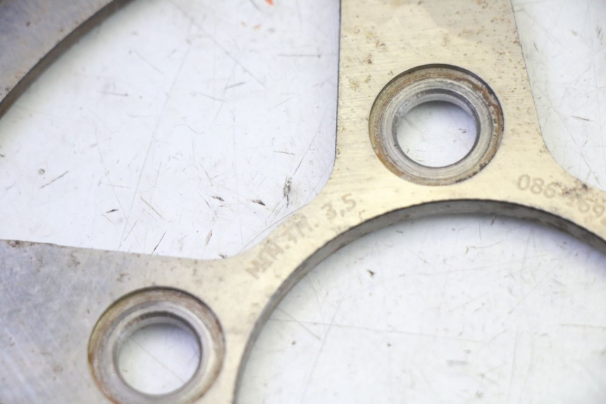 photo de DISQUE FREIN AVANT KYMCO GRAND DINK 125 (2002 - 2007) - Gros plan technique