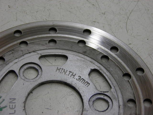 photo de DISQUE FREIN AVANT QINGQI SPEEDY 50 (2005 - 2007) - Zoom état d’usage