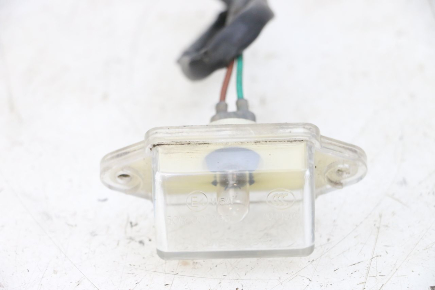 photo de ECLAIRAGE DE PLAQUE KYMCO AGILITY RS 4T 50 (2009 - 2013) - Détail de la pièce