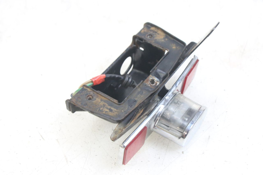 photo de ECLAIRAGE DE PLAQUE HONDA CA REBEL 125 (1995 - 2001) - Détail de la pièce