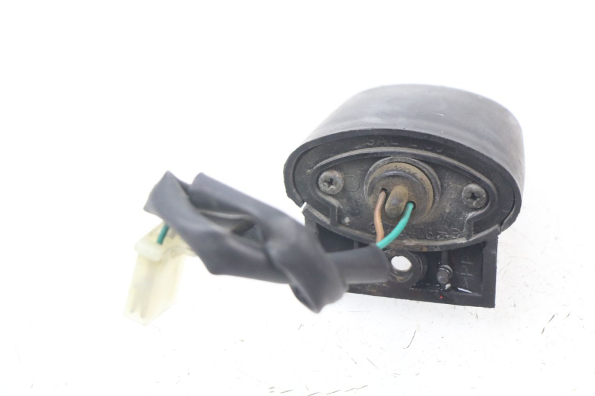 photo de ECLAIRAGE DE PLAQUE HONDA FES PANTHEON 125 (2003 - 2007) - Détail de la pièce