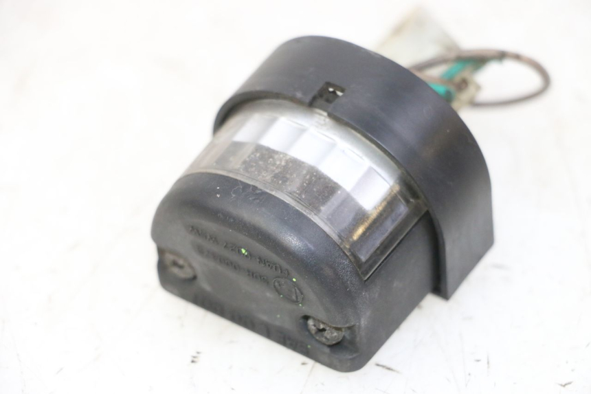 photo de ECLAIRAGE DE PLAQUE KYMCO GRAND DINK 125 (2008 - 2014) - Détail de la pièce