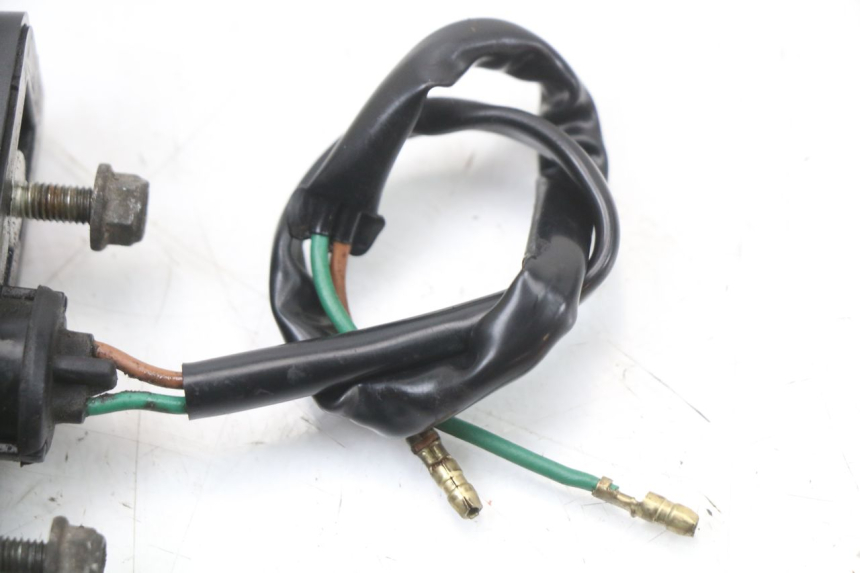 photo de ECLAIRAGE DE PLAQUE HONDA PCX (JF28) 125 (2009 - 2011) - Gros plan technique