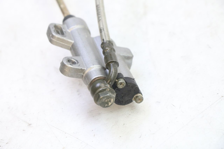 photo de ÉTRIER DE FREIN ARRIÈRE CCR DIRT BIKE 125 - Gros plan technique