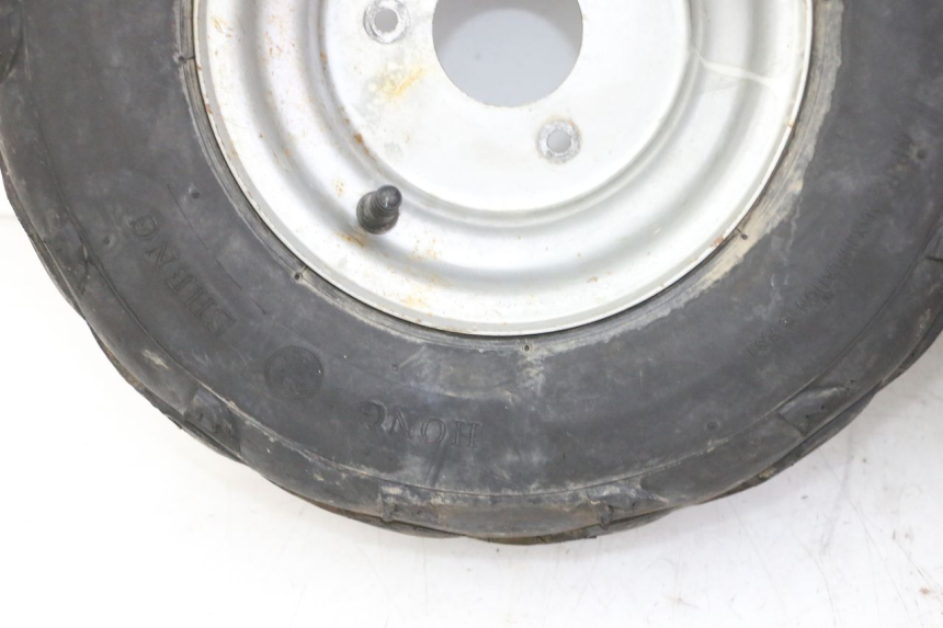 photo de JANTE ARRIÈRE ET PNEU SPEEDY DELUXE 125 - Marquages et références