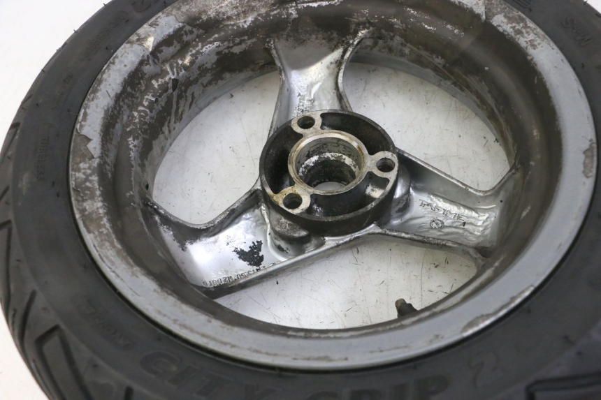 photo de JANTE ARRIÈRE ET PNEU PEUGEOT ELYSTAR 125 (2002 - 2007) - État de surface