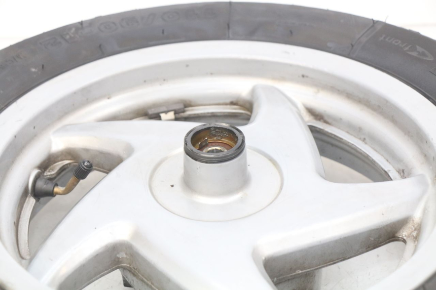 photo de JANTE AVANT HONDA FES PANTHEON 2T 125 (1998 - 2002) - Gros plan technique