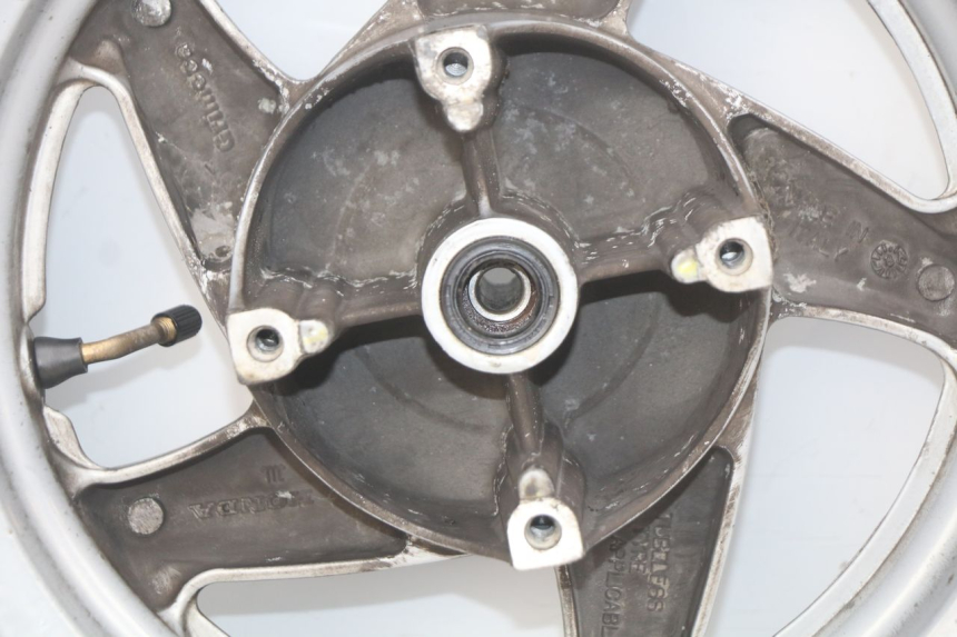 photo de JANTE AVANT HONDA FES PANTHEON 2T 125 (1998 - 2002) - Marquages et références