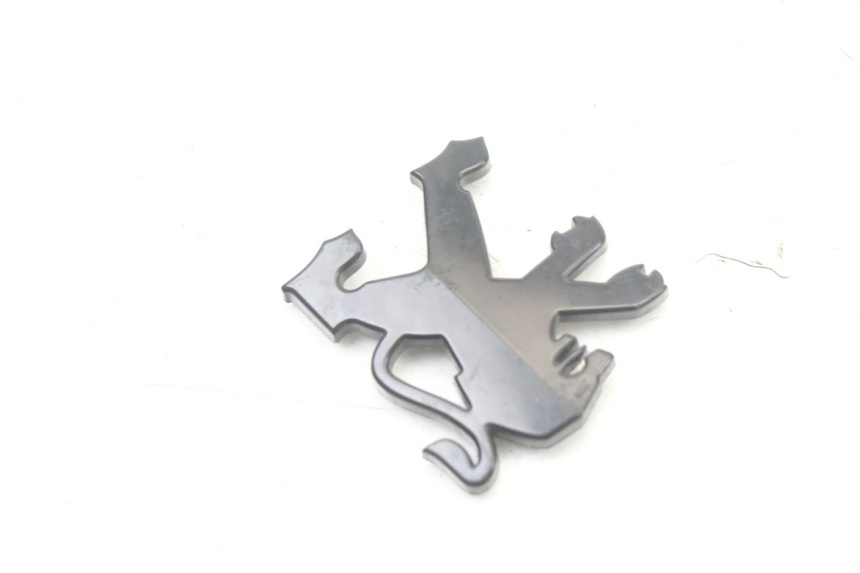 photo de LOGO MARQUE PEUGEOT TKR TREKKER FURIOUS 50 (2005 - 2014) - Détail de la pièce