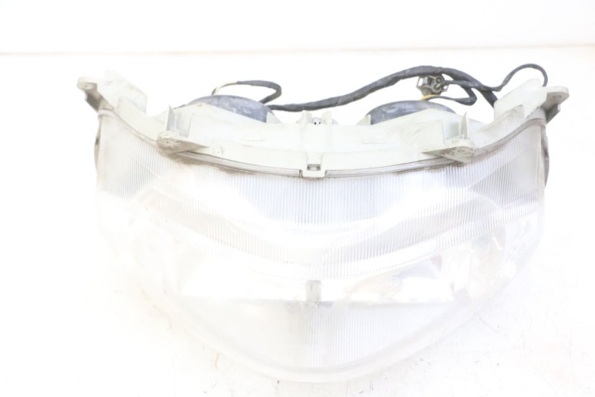 photo de PHARE AVANT SUZUKI BURGMAN 125 (2007 - 2014) - État de surface