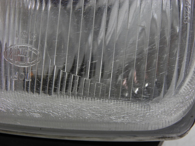 photo de PHARE AVANT HONDA NH VISION 50 (1985 - 1994) - Points de fixation