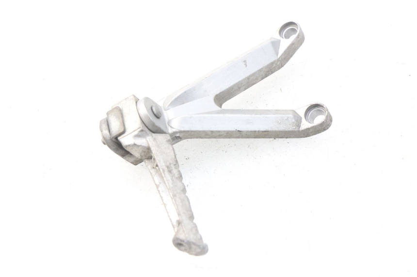 photo de PLATINE CALE PIED ARRIERE GAUCHE HYOSUNG COMET GTR 125 (2007 - 2014) - Zoom état d’usage