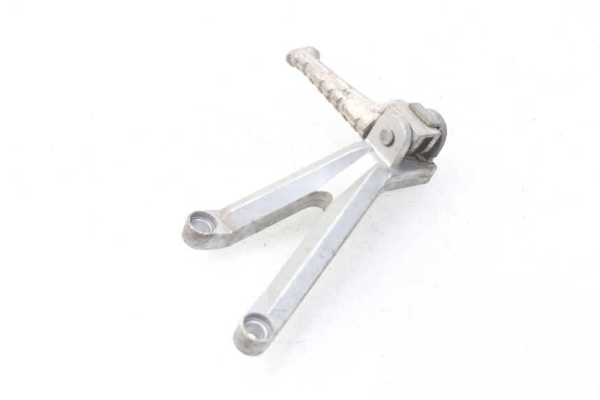 photo de PLATINE CALE PIED ARRIERE GAUCHE HYOSUNG COMET GTR 125 (2007 - 2014) - État de surface