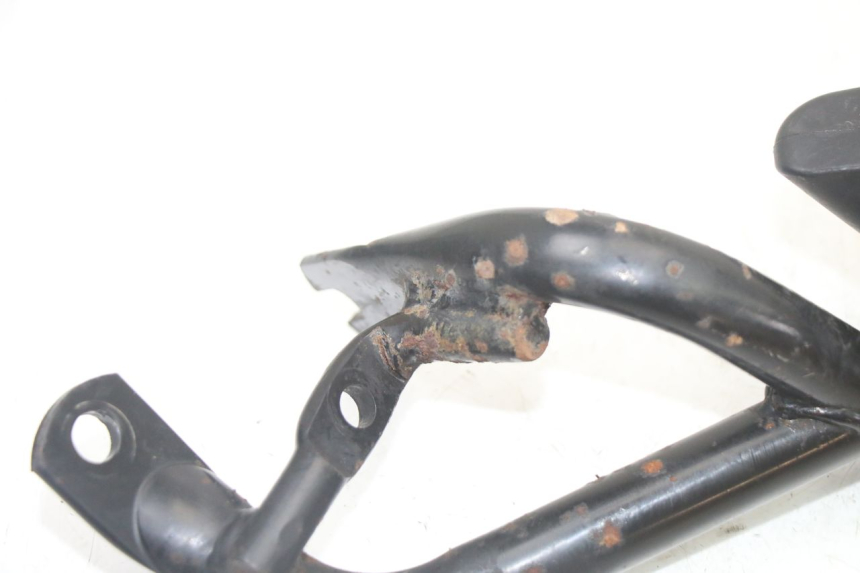 photo de PLATINE CALE PIED ARRIERE GAUCHE KYMCO PEOPLE S 125 (2000 - 2008) - État de surface