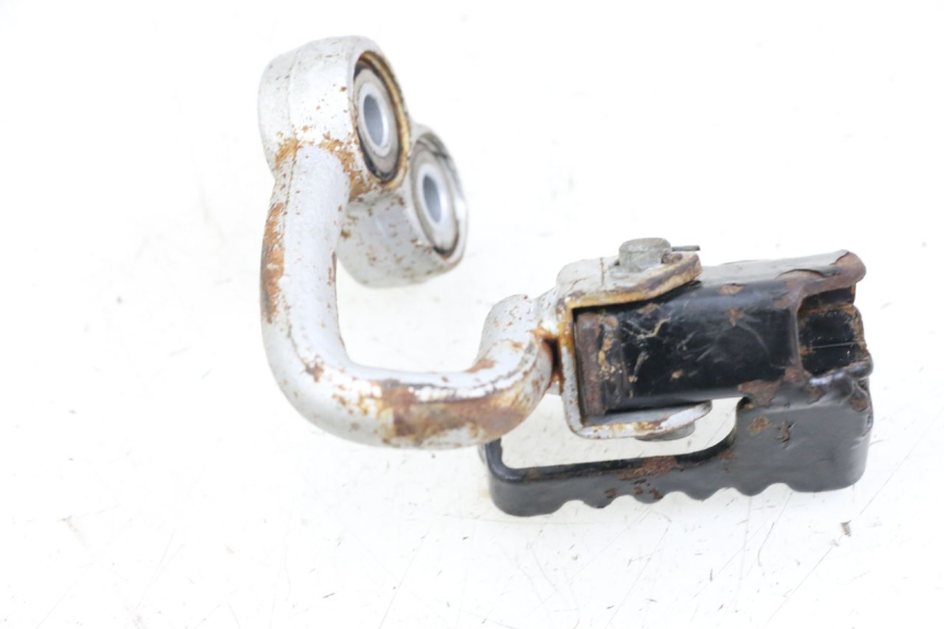 photo de Plaque de support du repose-pied avant droit HYOSUNG XRX 125 (2000 - 2008) - Zoom état d’usage