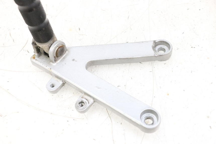 photo de PLATINE CALE PIED AVANT GAUCHE HONDA NSR R 125 (1994 - 2003) - Zoom état d’usage