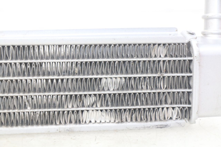 photo de RADIATEUR GAUCHE PEUGEOT LUDIX BLASTER 50 (2006 - 2014) - État de surface