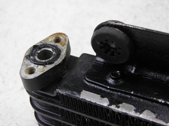 photo de RADIATEUR HUILE KYMCO QUANNON 125 (2007 - 2014) - Points de fixation