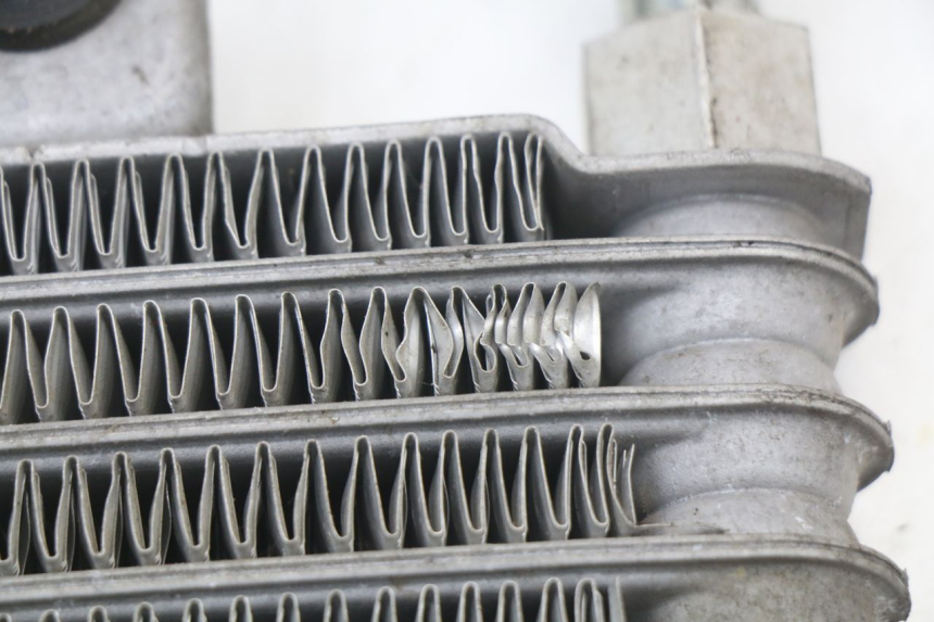 photo de RADIATEUR HUILE HYOSUNG XRX 125 (2000 - 2008) - Gros plan technique